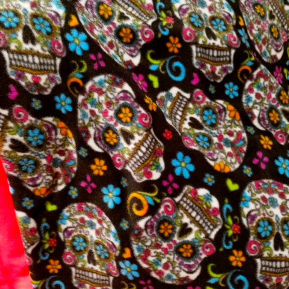 2 yards of Sugar Skulls poly fleece fabric